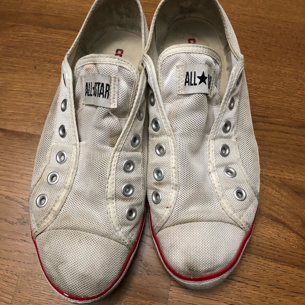 White Converse low top sneakers